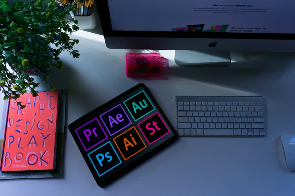 Designer's desk with a brand playbook