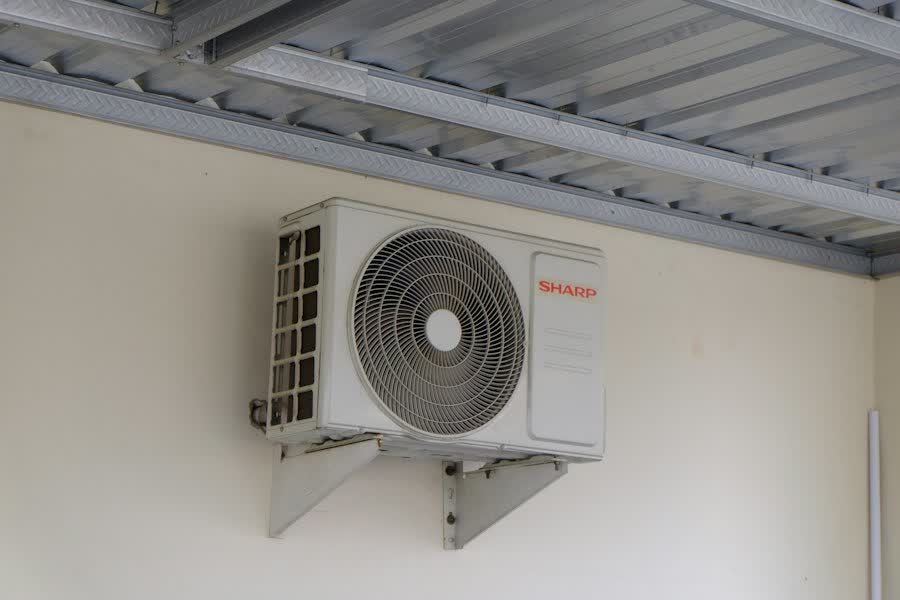Mini-split unit mounted on a wall