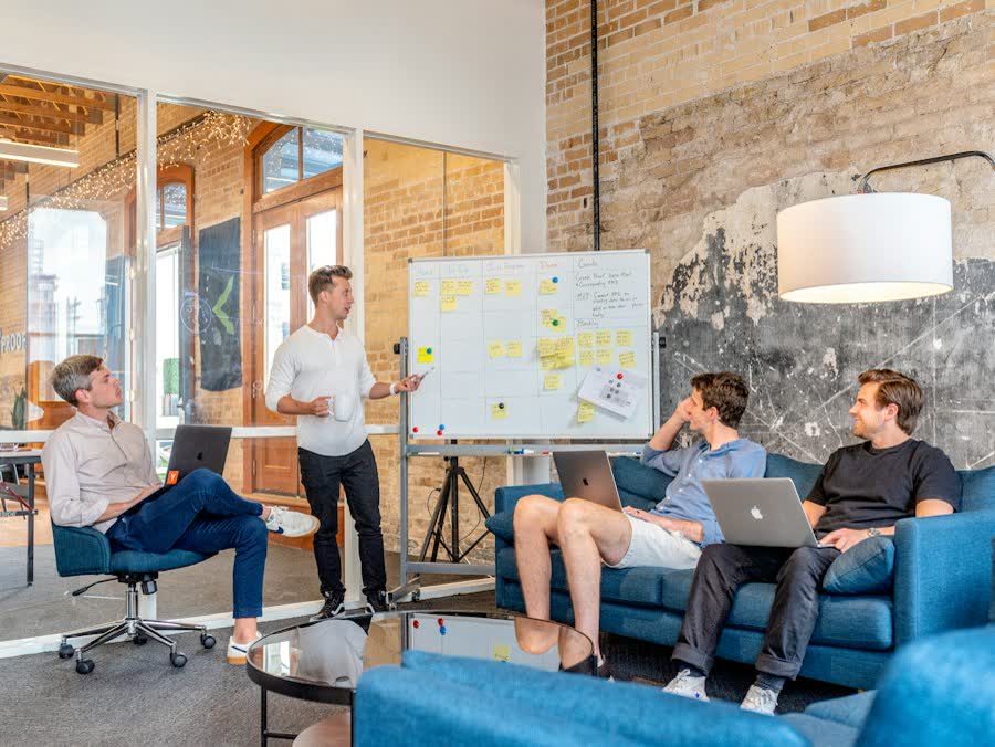 Team planning session at a whiteboard